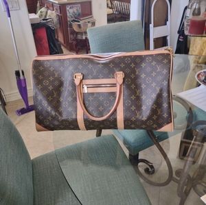 Gently used Louis Vuitton travel bag.
